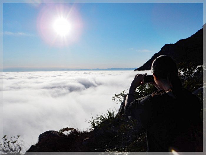 Taking a photo of Sea of Cloud around Table Mountain