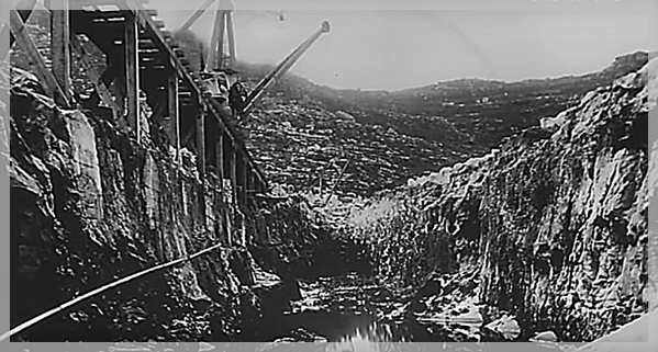 Black and white photo of construction of Woodhead Dam