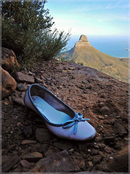 Woman&#x27;s Pump shoe found on Table Mountain trail with Lion&#x27;s Head in background