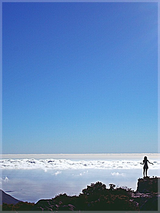 Girl on Table Mountain above a cloudsea